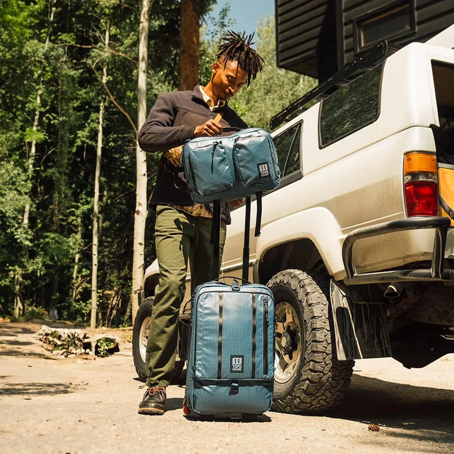 Topo Designs Global Travel Roller Bag Suitcase, 44L Carry-On, 3 Handles, Smooth Heavy Duty Wheels, Telescoping Handle, Durable   Rugged, WRAP Certified, PFAS Free (Apex Pond Blue)